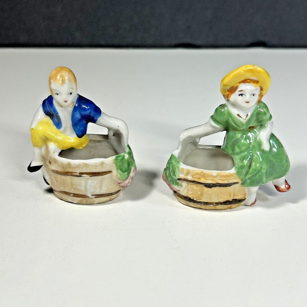 Pair Of Vtg Made in Occupied Japan Ceramic Figurines Girls Sitting On barrel